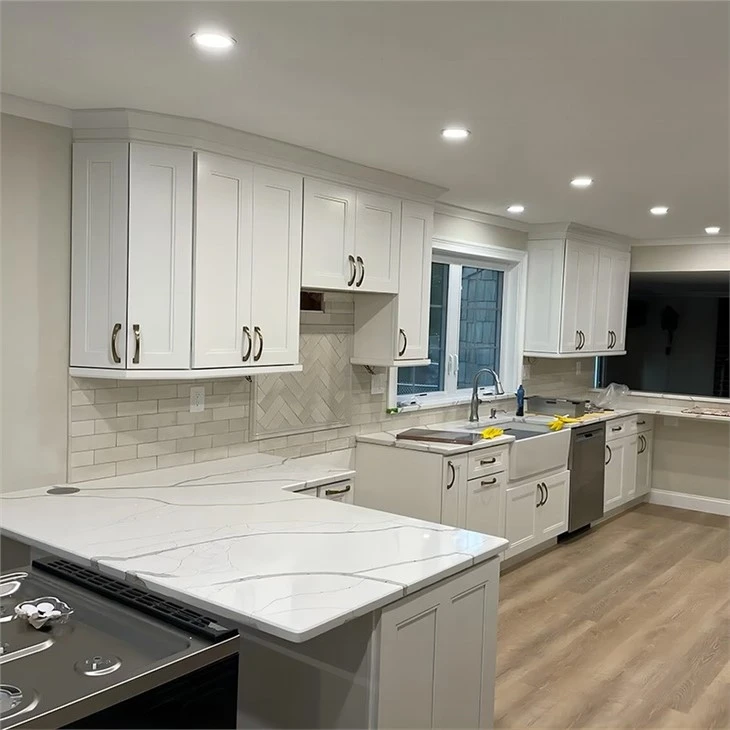 white shaker laundry cabinets